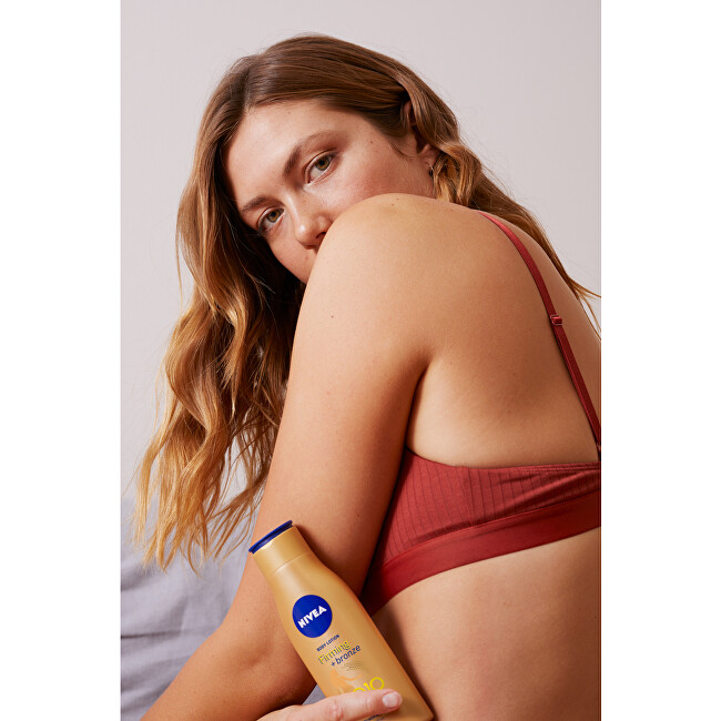 Nivea Firming toning body lotion Q10 Firming + Bronze (Body Lotion) 400 ml 400ml kojų priežiūros priemonė